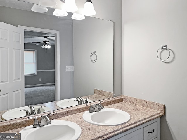 165 Riverbend Dr, Covington, GA 30014 - bathroom featuring ceiling fan and vanity