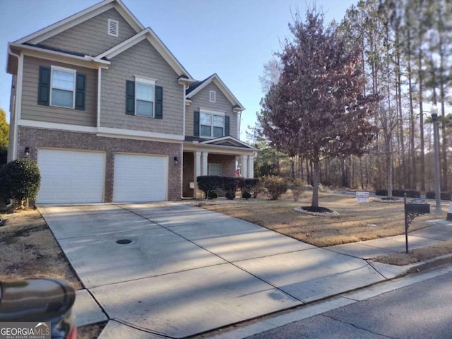 view of front of home with a garage