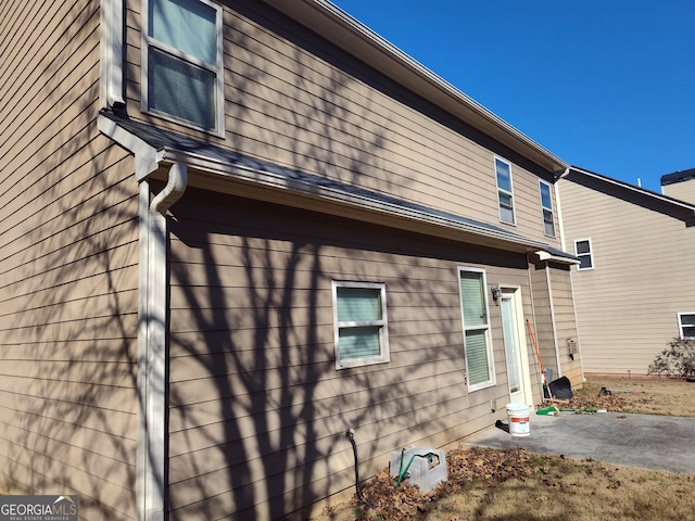 view of home's exterior with a patio