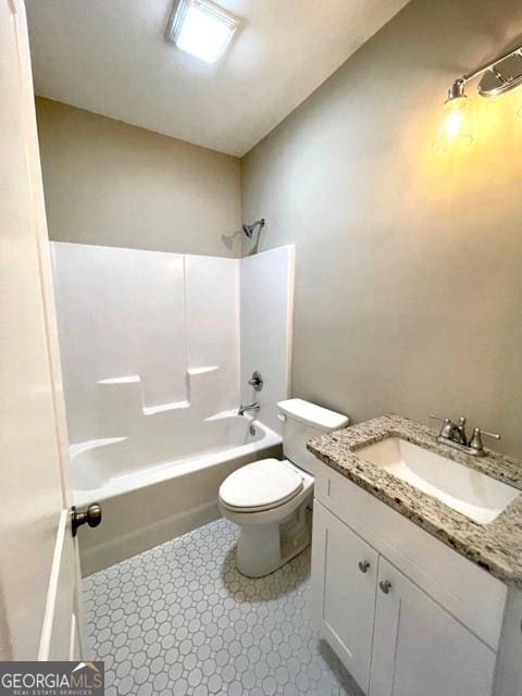 full bathroom featuring vanity, toilet, and shower / tub combination