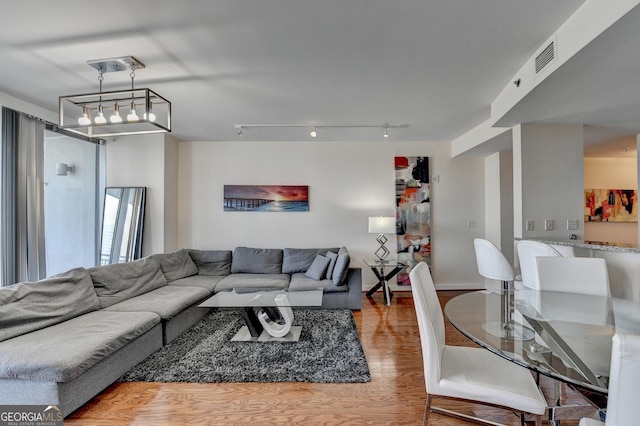 living room featuring light wood-type flooring