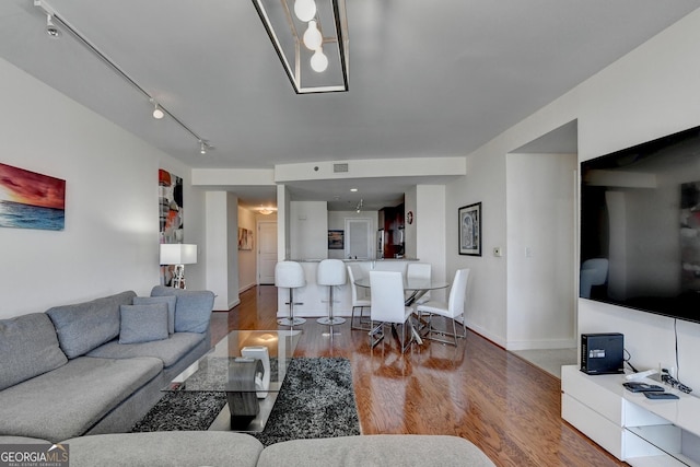 living room with hardwood / wood-style floors