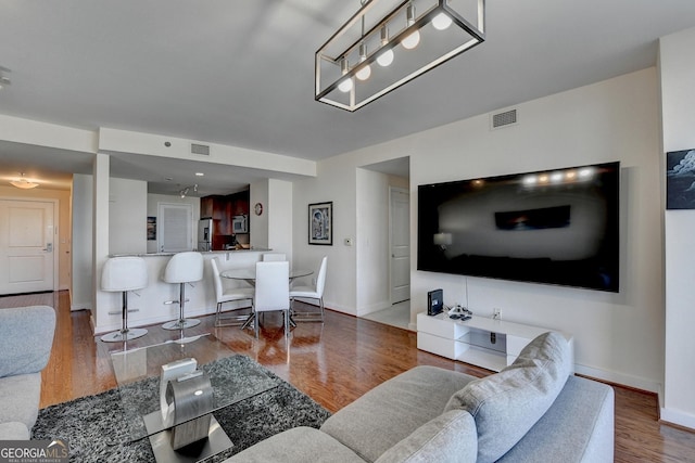 living room featuring hardwood / wood-style flooring