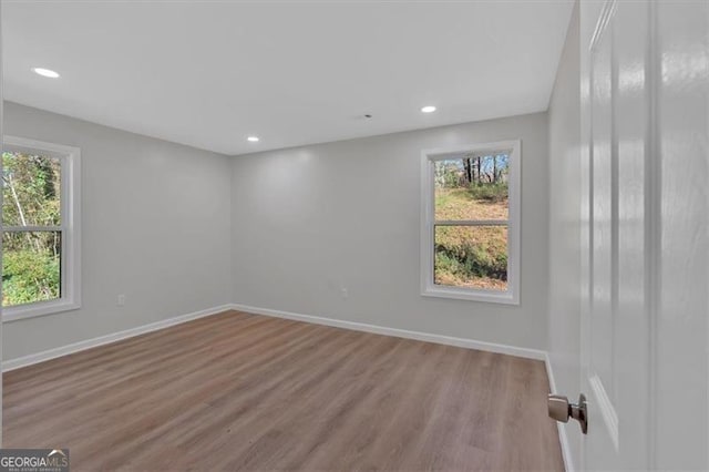 empty room featuring light hardwood / wood-style floors