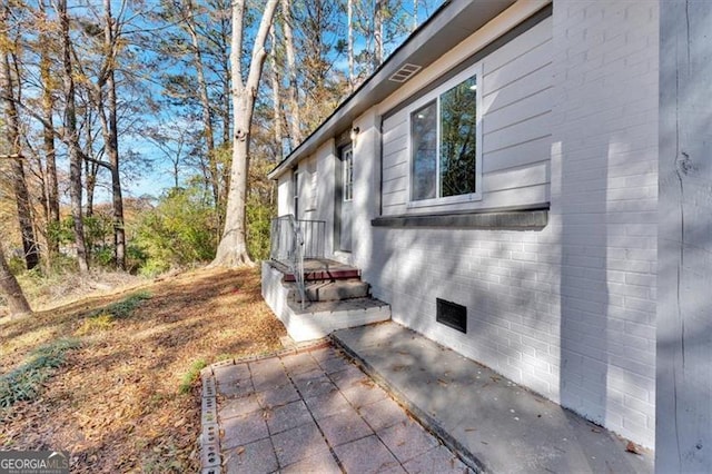 view of home's exterior featuring a patio area