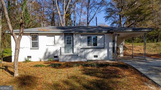 view of front of house featuring a carport