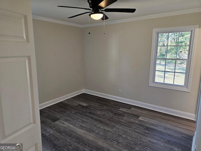 spare room with crown molding, ceiling fan, and dark hardwood / wood-style floors