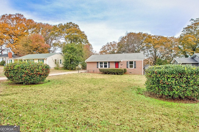 ranch-style house with a front yard