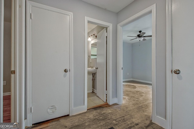 corridor featuring light hardwood / wood-style flooring