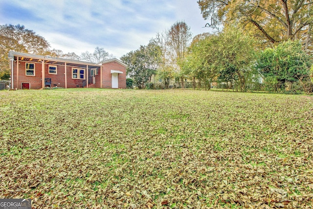 view of yard featuring a garage