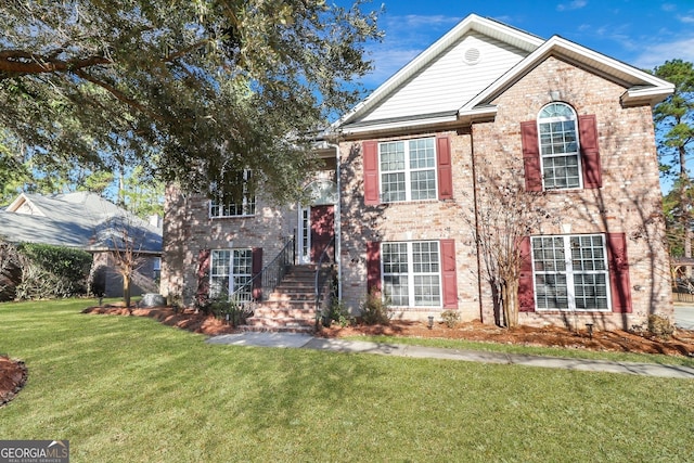 view of front of home featuring a front lawn