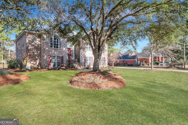 exterior space featuring a front lawn