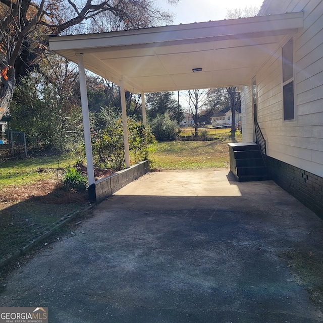 view of patio / terrace featuring a carport