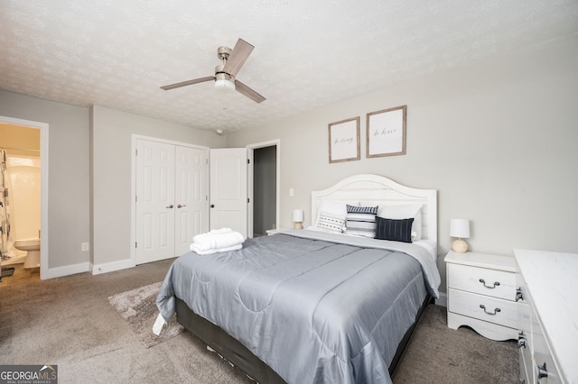 carpeted bedroom with ceiling fan, a closet, a textured ceiling, and ensuite bathroom