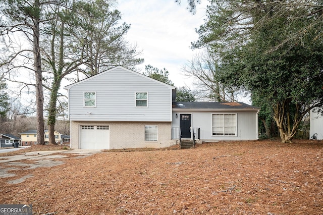 tri-level home featuring a garage