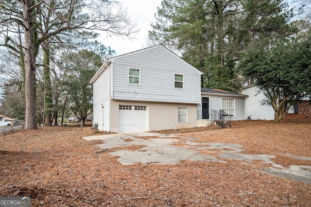 view of front of home with a garage