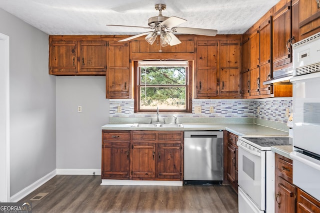 kitchen with electric range, a sink, dark wood finished floors, light countertops, and dishwasher