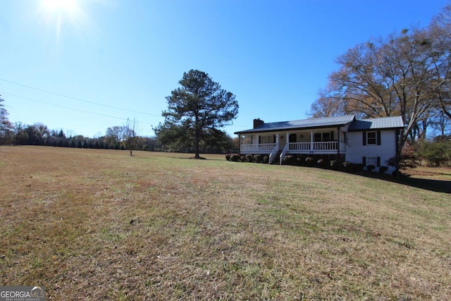 view of yard featuring a porch