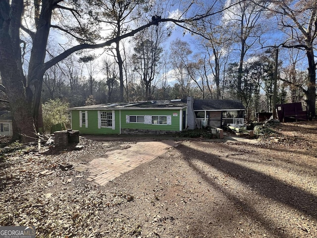 202 Hayes St, Villa Rica, GA 30180 - view of front of property with a chimney and driveway
