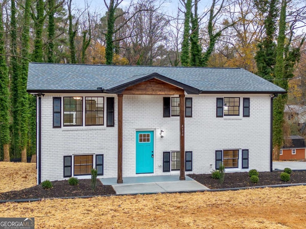 bi-level home with a patio