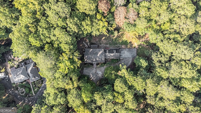 drone / aerial view with a view of trees