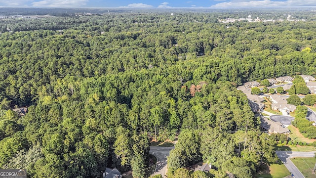 aerial view featuring a view of trees