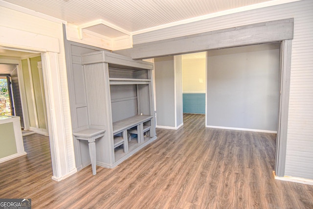 unfurnished living room featuring dark hardwood / wood-style flooring