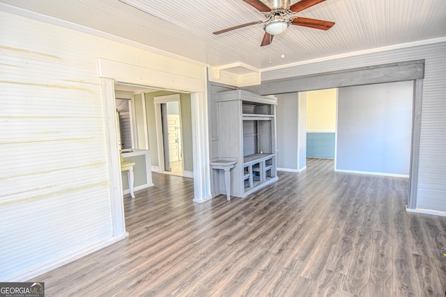 unfurnished living room with ceiling fan and dark wood-type flooring