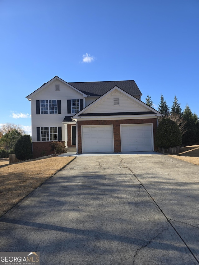 view of property with a garage