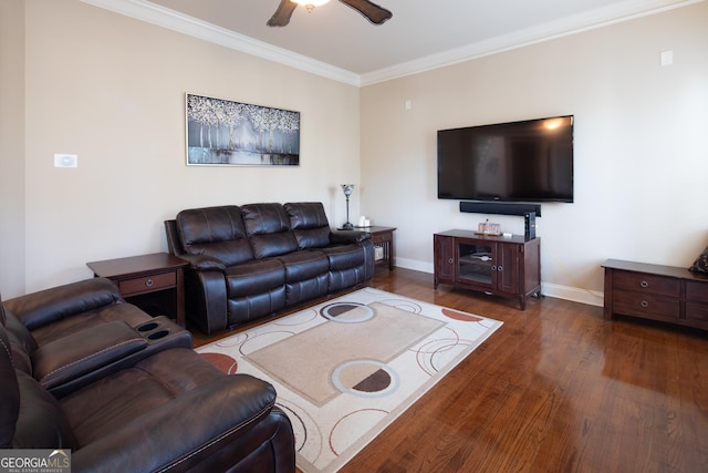 living room featuring ceiling fan, dark wood-type flooring, and crown molding