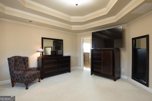 sitting room featuring crown molding, light carpet, and a raised ceiling