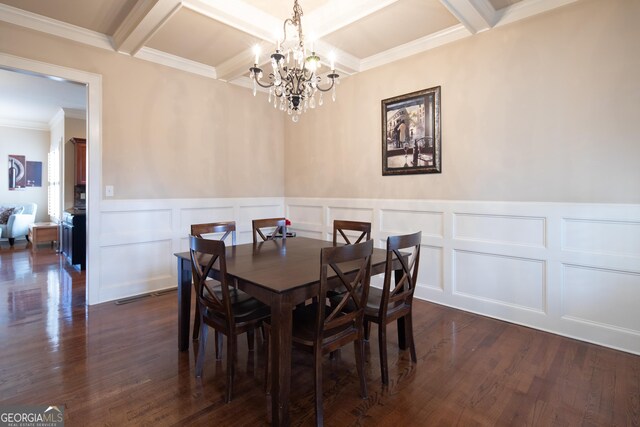 stairway featuring crown molding, beam ceiling, hardwood / wood-style floors, coffered ceiling, and a chandelier