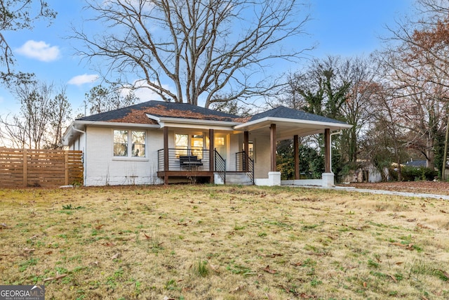 view of front of home featuring a porch and a front yard