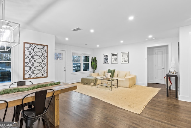 living room featuring dark hardwood / wood-style floors