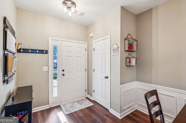 foyer featuring dark hardwood / wood-style floors