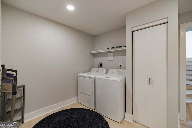 laundry area featuring independent washer and dryer