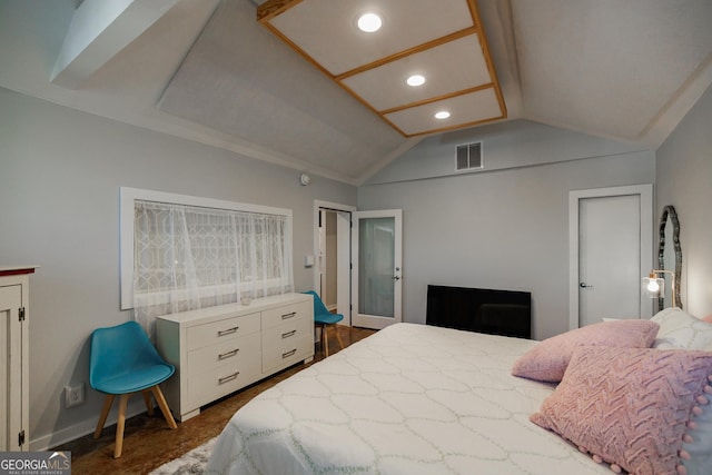 carpeted bedroom with vaulted ceiling