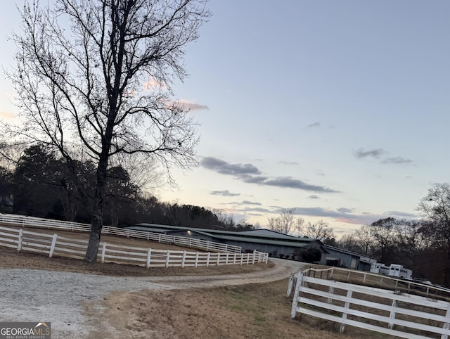 view of yard at dusk