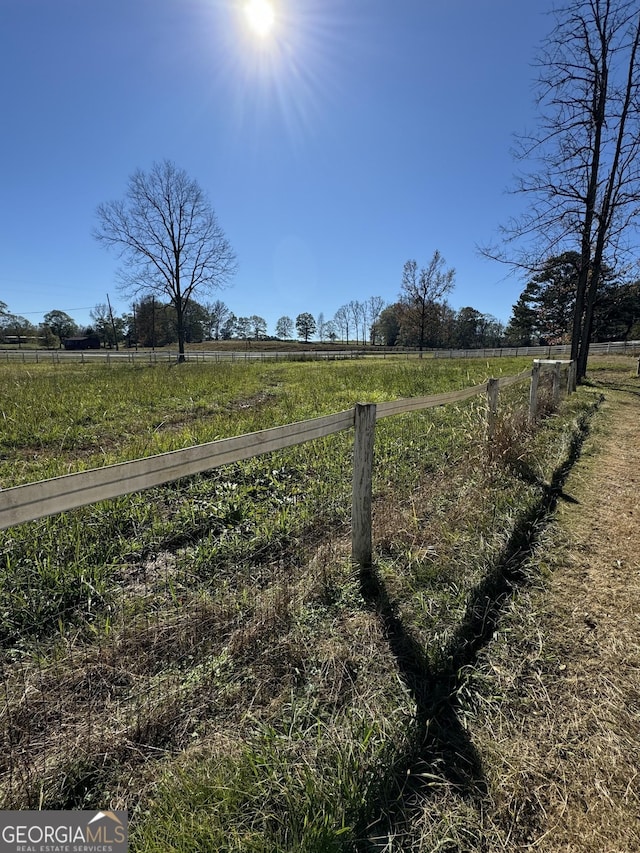 view of yard featuring a rural view