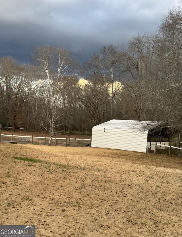 view of yard with a carport