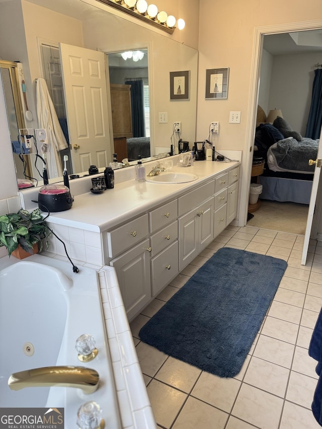 bathroom with tile patterned flooring and vanity