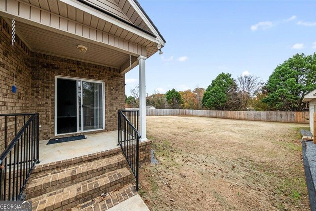 view of yard with a patio area