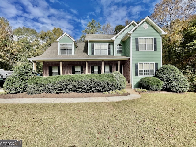 view of front facade with a front lawn