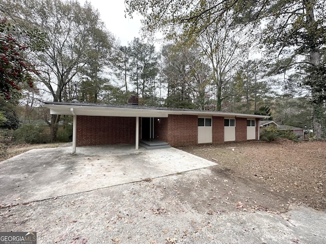 view of front of house featuring a carport