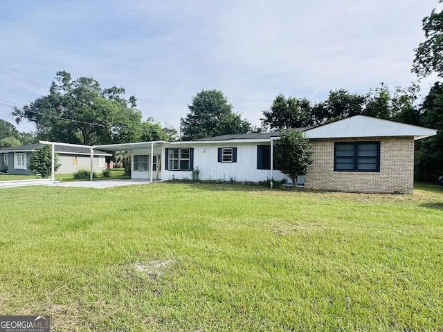 3039 Albany Ave, Waycross, GA 31503 - single story home with an attached carport, driveway, a front yard, and brick siding