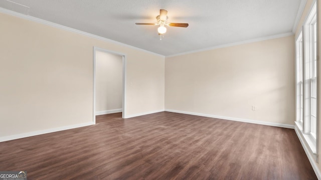 unfurnished room featuring ceiling fan, dark wood-type flooring, a textured ceiling, and ornamental molding