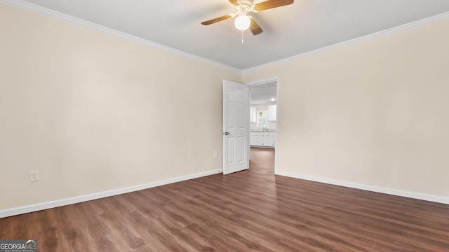 empty room with dark hardwood / wood-style floors, ceiling fan, ornamental molding, and a textured ceiling