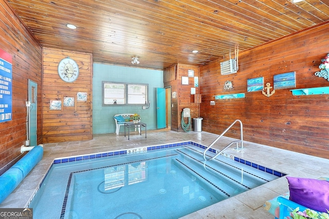 view of swimming pool featuring an indoor in ground hot tub