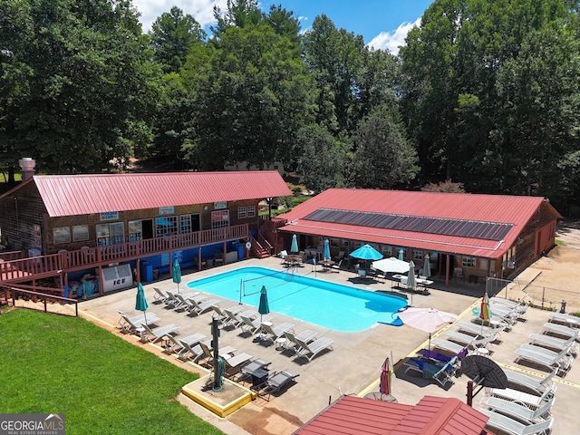 view of swimming pool featuring a patio