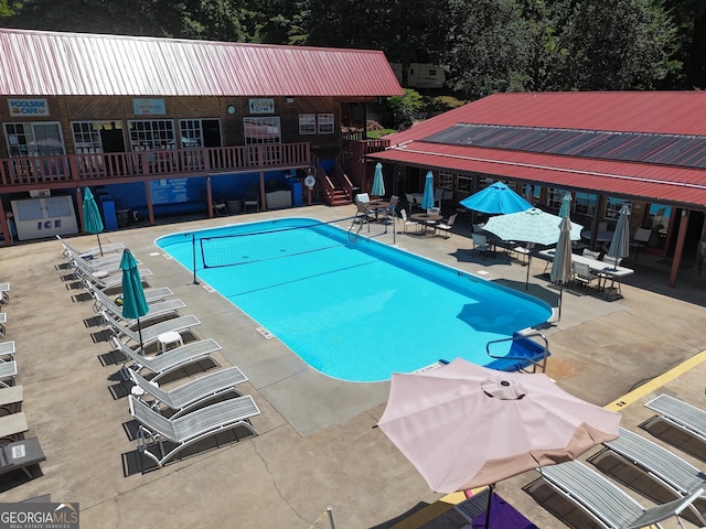 view of swimming pool featuring a patio